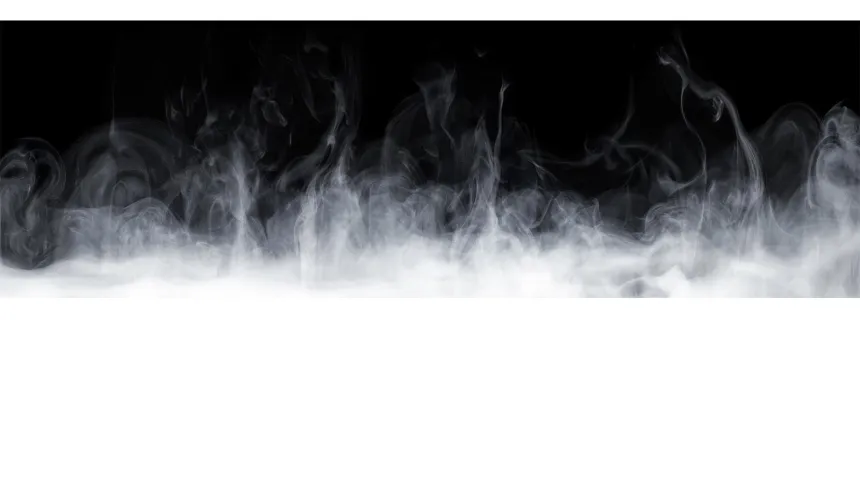 White steam rising in wisps against a black background
