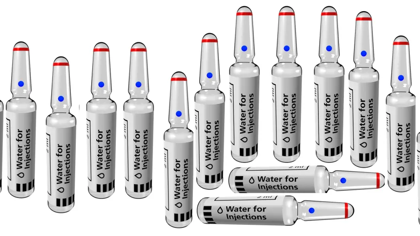 Rows of 2 ml glass ampoules labelled Water for Injections, with red rings and blue dots on their necks