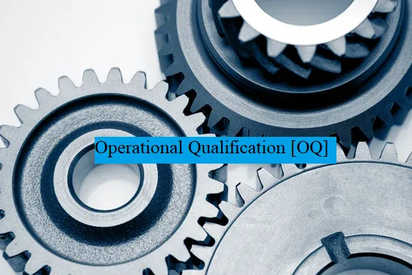Close-up of interlocking metal gears with the label Operational Qualification OQ